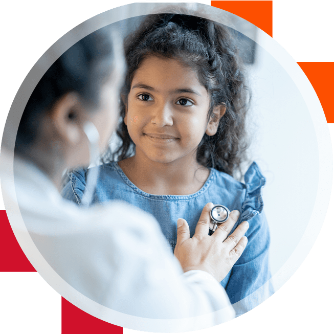 A young girl being examined by a medical professional