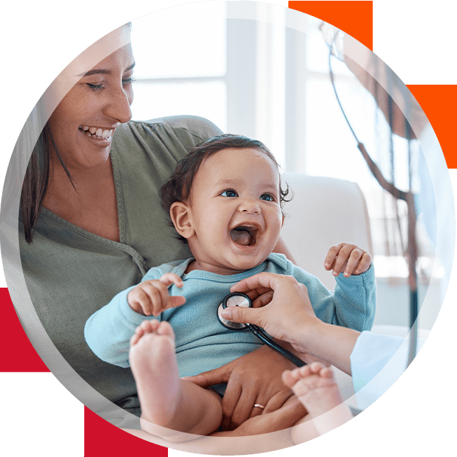 A laughing baby being stethoscoped